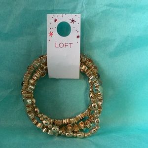 Gold colored bracelet set (3)